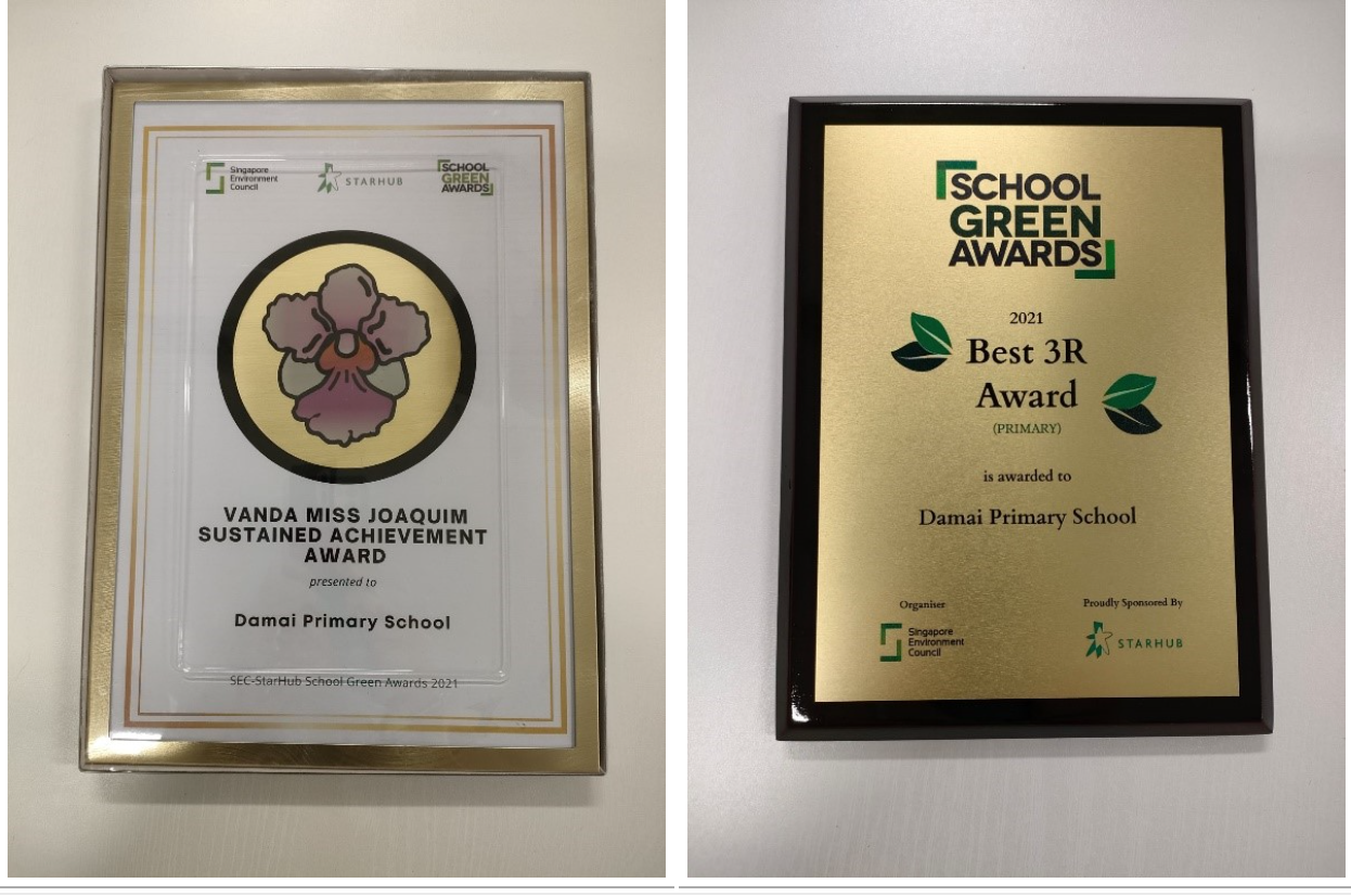 Two School Green Awards plaques presented to Damai Primary School: Vanda Miss Joaquim Sustained Achievement and 2021 Best 3R Award.